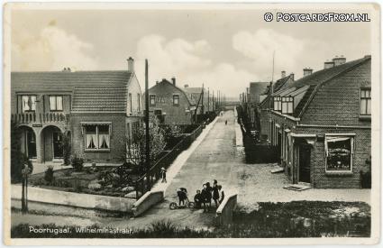 ansichtkaart: Poortugaal, Wilhelminastraat. Winkel Kruidenierswaren